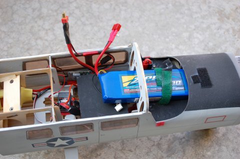 Battery placement and arming plug